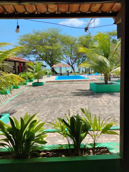 Churrasqueira com vista para a praia na pousada